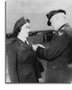 WASP Pilot Barbara Erickson Receiving a medal