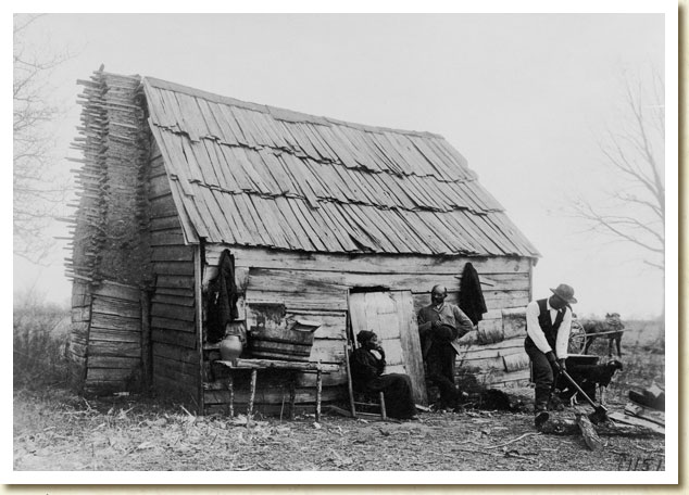 Photograph, African American Family Outside Their Cabin in Virginia, ca. 1900