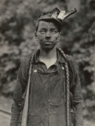 Young Driver in Mine. Has been driving one year. 7 A.M. to 5:30 P.M daily Brown Mine, Brown W. VA. photograph and caption by Lewis Hine, 1908.