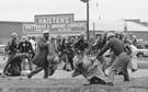 John Lewis (in the foreground) being beaten by state troopers, March 7, 1965
