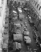 Shanties were built in a courtyard at Santo Tomas to help ease the overcrowding in the buildings, 1945