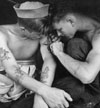Much tattooed sailor aboard the USS New Jersey (BB 62