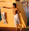 Boy against a yellow platform at the Kosciusko Swimming Pool 