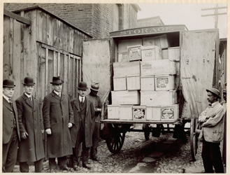 historical image of FDA inspectors and delivery truck