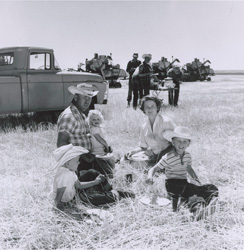 historical image of family picnicking