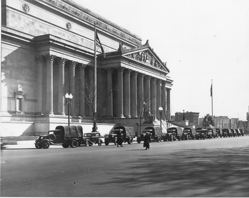 Army trucks transport records along on Constitution Avenue to the National Archives from Schuykill Arsenal in Philadelphia during World War II.