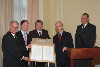 Archivist Allen Weinstein presents a facsimile of Presidential Proclamation 6194.