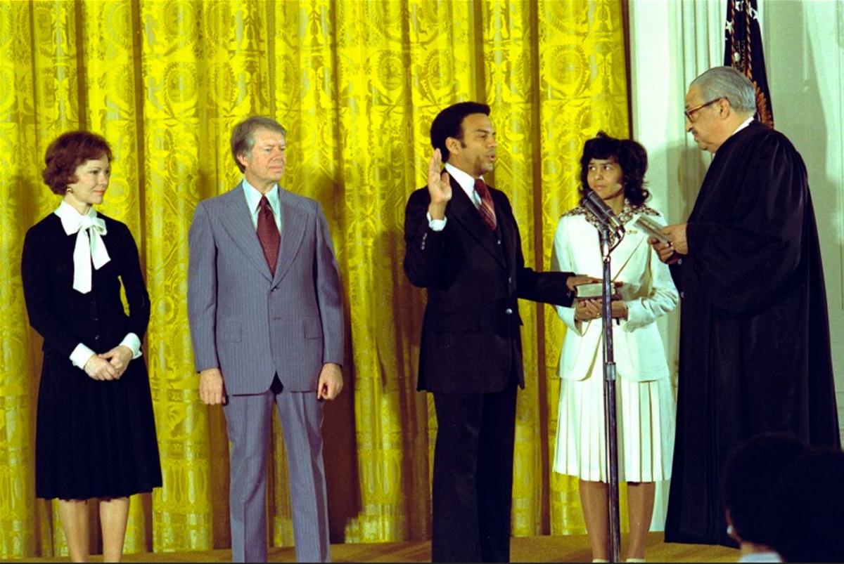 Andrew Young being sworn in as the U.S. Representative to the United Nations, with President Jimmy Carter and First lady Rosalynn Carter