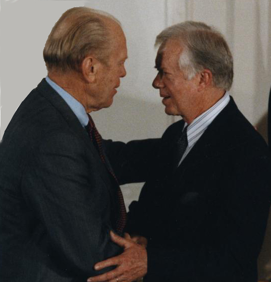 Gerald Ford and Jimmy Carter shake hands