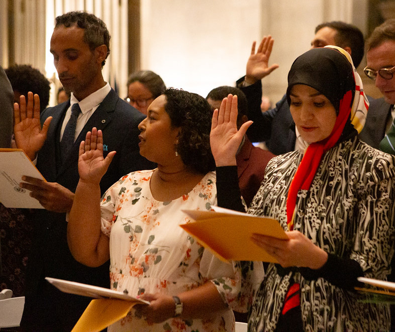 Petitioners take the oath of citizenship in the National Archives Rotunda