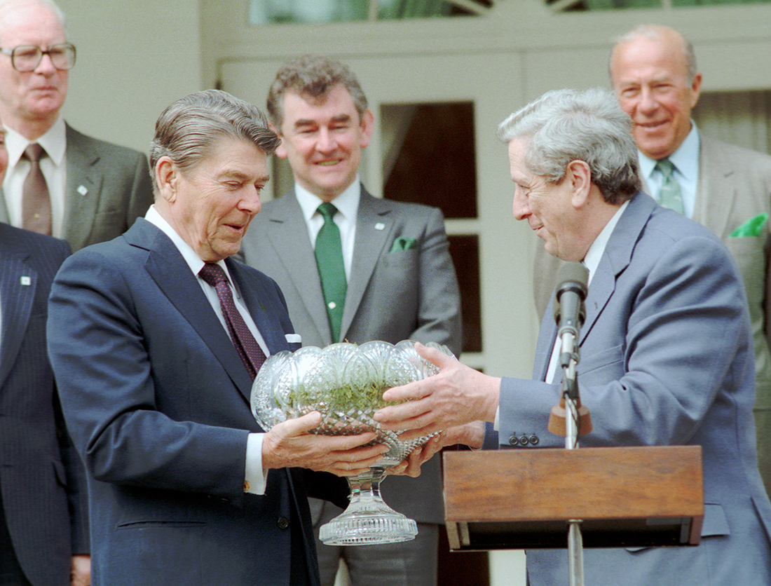 President Reagan receives a bowl of shamrocks from the Irish Ambassador