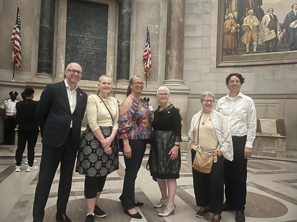 visitors pose in the Rotunda