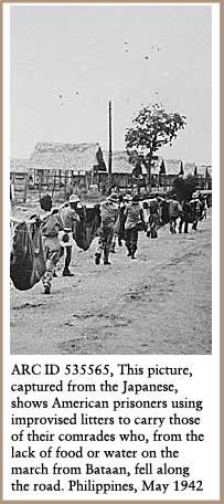 American prisoners using improvised litters to carry those of their comrades who ... fell along the road.