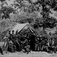 5. Engineers of the 8th New York State Militia in front of a tent, 1861.